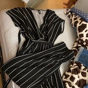 Striped jumpsuit with tie at waist